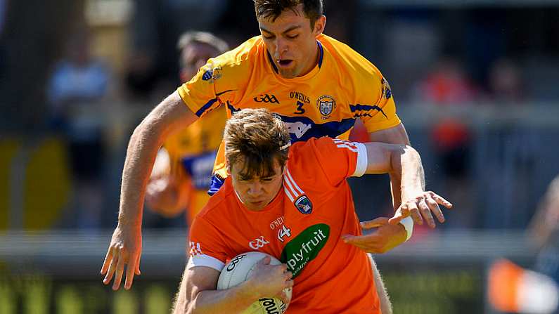 30 June 2018; Andrew Murnin of Armagh in action against Cillian Brennan of Clare during the GAA Football All-Ireland Senior Championship Round 3 match between Armagh and Clare at the Athletic Grounds in Armagh. Photo by Seb Daly/Sportsfile