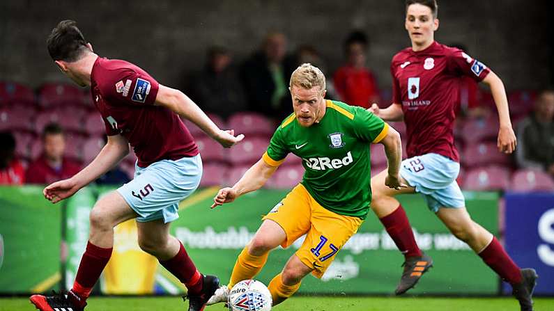 17 July 2018; Daryl Horgan of Preston North End in action against James McSweeney, left, and Stephen O'Connor of Cobh Ramblers during the friendly match between Cobh Ramblers and Preston North End at Turners Cross in Cork. Photo by Brendan Moran/Sportsfile