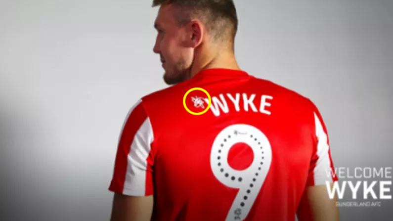 What Is The 'Squiggle' On Championship Shirts?