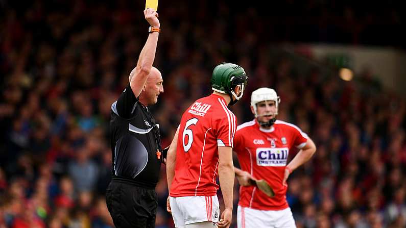 26 August 2018; Mark Coleman of Cork, centre, is shown a yellow card by referee John Keenan during the Bord Gais Energy GAA Hurling All-Ireland U21 Championship Final match between Cork and Tipperary at the Gaelic Grounds in Limerick. Photo by Sam Barnes/Sportsfile