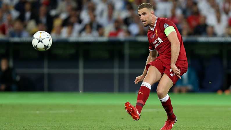 KYIV, UKRAINE - MAY 26, 2018: Portrait of Liverpool captain Jordan Henderson passing the ball. UEFA Champions League final Real Madrid - Liverpool. Olympic NSC stadium.