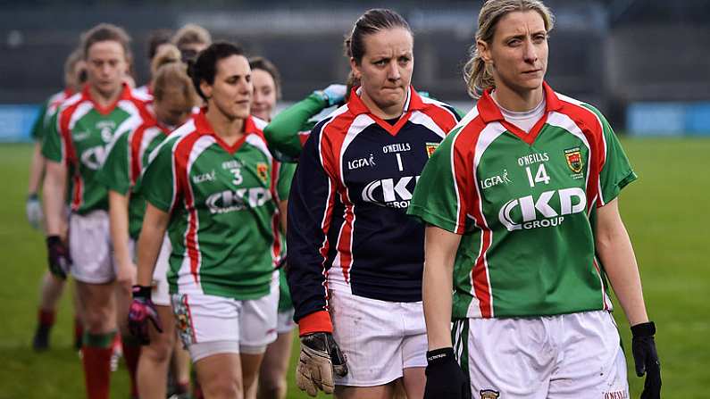 3 December 2017; Captain of Carnacon Cora Staunton leads her team during the parade prior to the All-Ireland Ladies Football Senior Club Senior Championship Final match between Carnacon and Mourneabbey at Parnell Park in Dublin. Photo by Seb Daly/Sportsfile