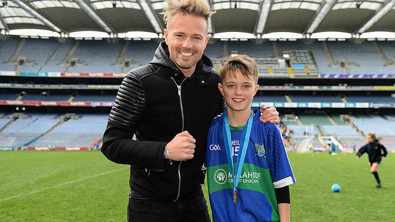 23 October 2018; Westlife member Nicky Byrne with his son Rocco Byrne from St. Oliver Plunkett NS, Malahide, Co Dublin, during day 2 of the Allianz Cumann na mBunscol Finals at Croke Park in Dublin. Photo by Harry Murphy/Sportsfile