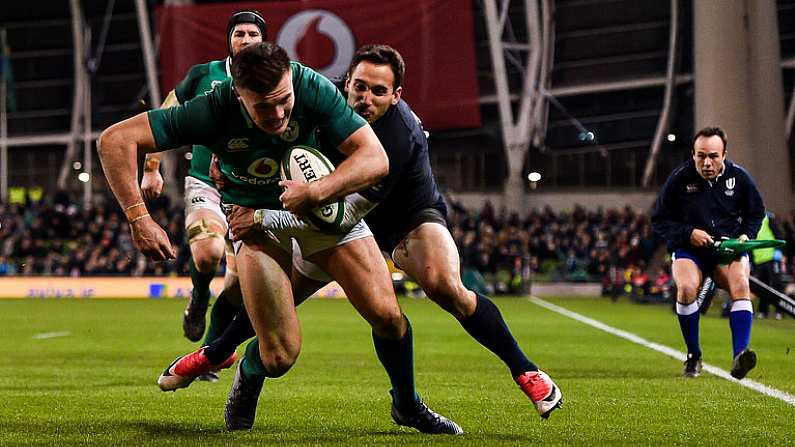 25 November 2017; Jacob Stockdale of Ireland dives over to score his side's second try despite the tackle of Joaquin Tuculet of Argentina during the Guinness Series International match between Ireland and Argentina at the Aviva Stadium in Dublin. Photo by Ramsey Cardy/Sportsfile