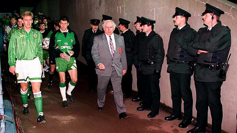 17 Nov 1993. Northern Ireland captain Alan McDonald and Rep of Ireland captain Andy Townsend lead their teams onto the field, watched by the RUC. World Cup Qualifier, Northern Ireland v Republic of Ireland, Windsor Park, Belfast. Picture Credit: Ray McManus/SPORTSFILE.