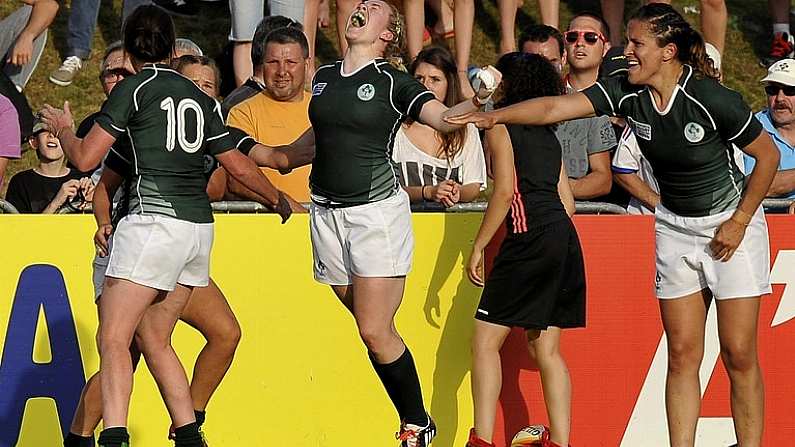 5 August 2014; Ireland players Ashleigh Baxter, Nora Stapleton, Niamh Briggs and Tania Rosser celebrate victory over New Zealand. 2014 Women's Rugby World Cup Final, Pool B, Ireland v New Zealand, Marcoussis, Paris, France. Picture credit: Aurelien Meunier / SPORTSFILE