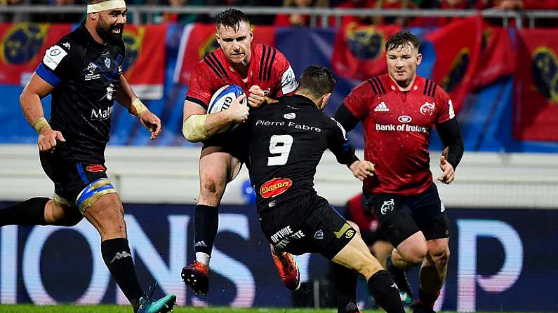 15 December 2018; Rory Scannell of Munster is tackled by Rory Kockott of Castres Olympique during the Heineken Champions Cup Pool 2 Round 4 match between Castres and Munster at Stade Pierre Fabre in Castres, France. Photo by Brendan Moran/Sportsfile