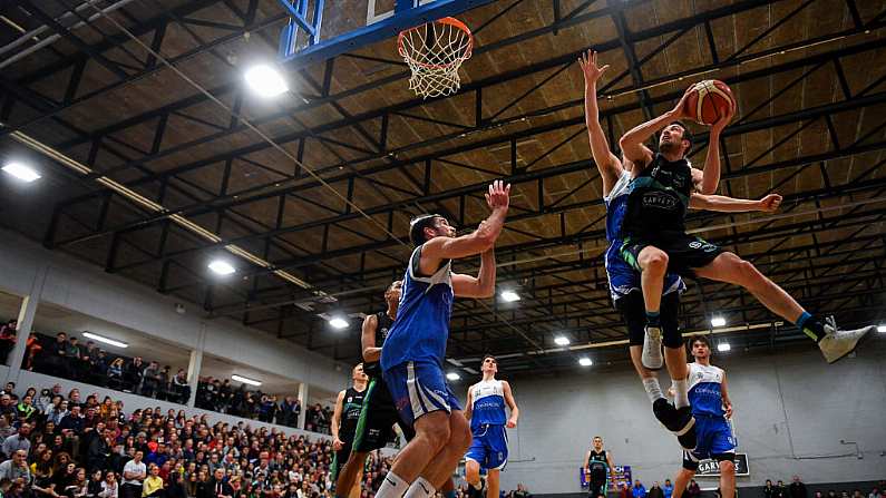 2 March 2019; Eoin Quigley of Garvey's Tralee Warriors goes up for a basket despite the attention of Sean Seller of Maree during the Basketball Ireland Men's Superleague match between Garvey's Tralee Warriors and Maree at the Tralee Sports Complex in Tralee, Co. Kerry. Photo by Brendan Moran/Sportsfile