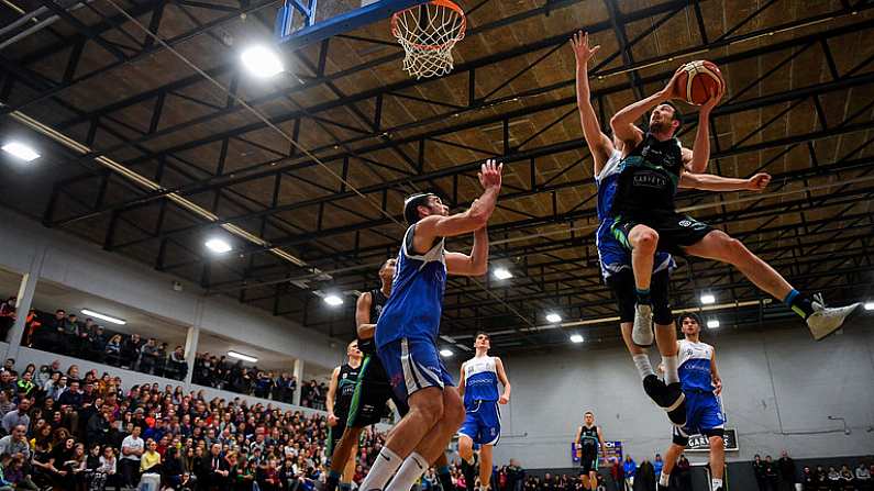 2 March 2019; Eoin Quigley of Garvey's Tralee Warriors goes up for a basket despite the attention of Sean Seller of Maree during the Basketball Ireland Men's Superleague match between Garvey's Tralee Warriors and Maree at the Tralee Sports Complex in Tralee, Co. Kerry. Photo by Brendan Moran/Sportsfile