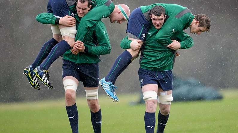 20 February 2014; Ireland's Peter O'Mahony carries Andrew Trimble during a warm-up drill at squad training ahead of their RBS Six Nations Rugby Championship match against England on Saturday. Ireland Rugby Squad Training, Carton House, Maynooth, Co. Kildare. Picture credit: Stephen McCarthy / SPORTSFILE