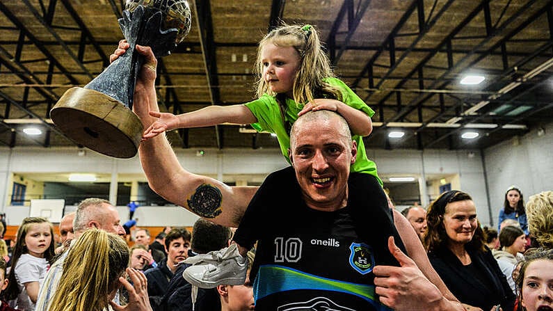 24 March 2019; Kieran Donaghy of Garvey's Tralee Warriors celebrates with his 3-year-old daughter Lola Rose after the Basketball Ireland Men's Superleague match between Garvey's Warriors Tralee and UCD Marian in the Tralee Sports Complex in Tralee, Co. Kerry. Photo by Diarmuid Greene/Sportsfile