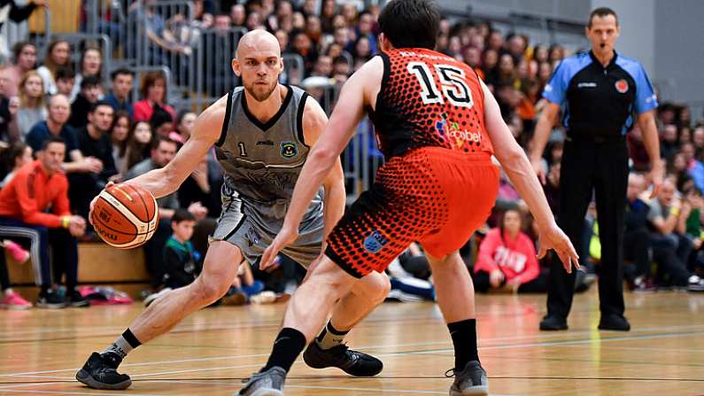 12 January 2019; Paul Dick of Garvey's Tralee Warriors in action against Ciaran Roe of Pyrobel Killester during the Hula Hoops Mens Pat Duffy National Cup semi-final match between Pyrobel Killester and Garveys Tralee Warriors at the Mardyke Arena UCC in Cork. Photo by Brendan Moran/Sportsfile