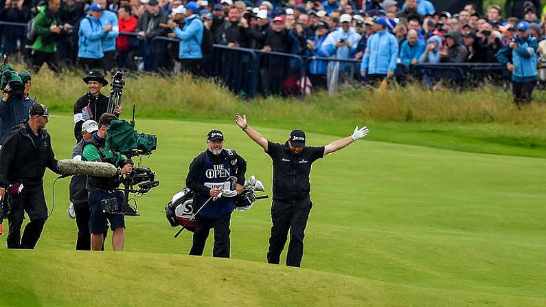 21 July 2019; Shane Lowry of Ireland celebrates after playing his approach shot on the 18th fairway during Day Four of the 148th Open Championship at Royal Portrush in Portrush, Co Antrim. Photo by Brendan Moran/Sportsfile