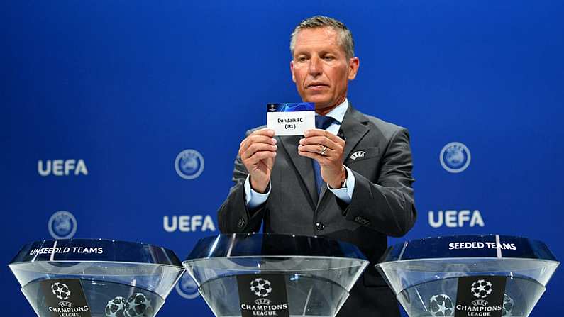 18 June 2019; UEFA Head of Club Competitions Michael Heselschwerdt draws out the name of Dundalk FC during the UEFA Champions League first qualifying round draw at the UEFA headquarters, The House of European Football in Nyon, Switzerland. Photo by UEFA via Sportsfile