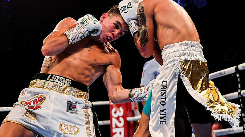 3 August 2019; Michael Conlan, left, in action against Diego Alberto Ruiz during their WBA and WBO Inter-Continental Featherweight title bout at Falls Park in Belfast. Photo by Ramsey Cardy/Sportsfile