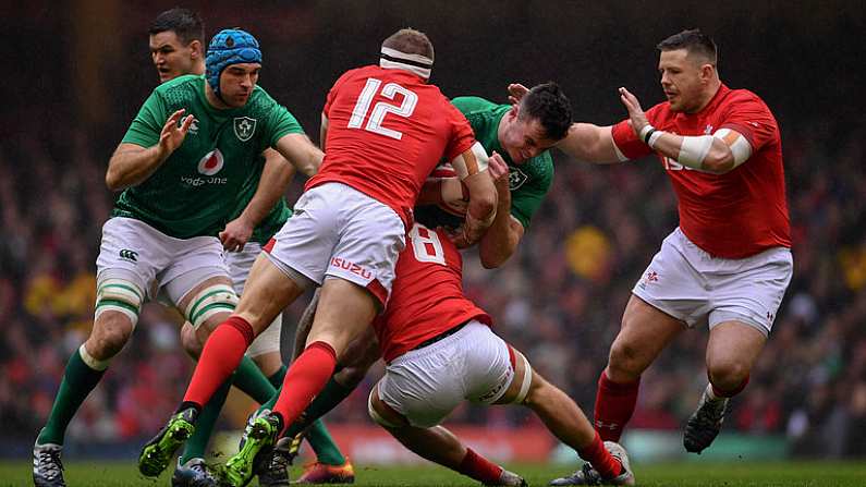 16 March 2019; James Ryan of Ireland is tackled by Hadleigh Parkes, left, and Ross Moriarty of Wales during the Guinness Six Nations Rugby Championship match between Wales and Ireland at the Principality Stadium in Cardiff, Wales. Photo by Ramsey Cardy/Sportsfile