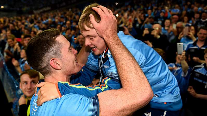 14 September 2019; Brian Fenton of Dublin celebrates with a Dublin supporter following the GAA Football All-Ireland Senior Championship Final Replay match between Dublin and Kerry at Croke Park in Dublin. Photo by Eoin Noonan/Sportsfile