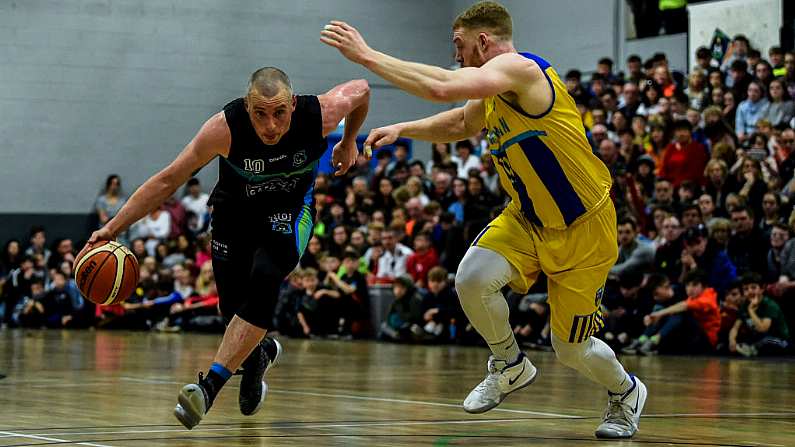 24 March 2019; Kieran Donaghy of Garvey's Tralee Warriors in action against Matt Kelly of UCD Marian during the Basketball Ireland Men's Superleague match between Garvey's Warriors Tralee and UCD Marian in the Tralee Sports Complex in Tralee, Co. Kerry. Photo by Diarmuid Greene/Sportsfile