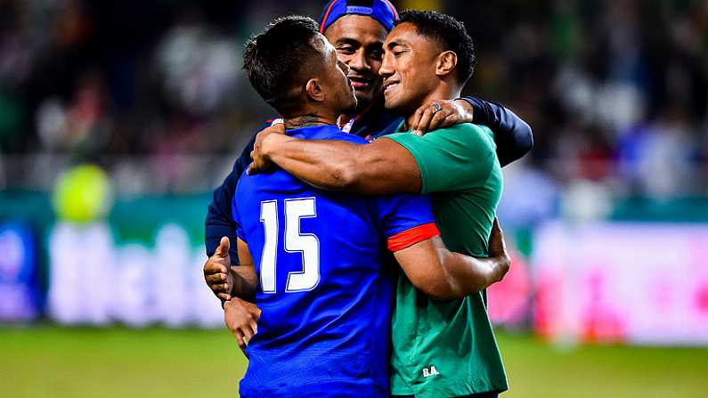 12 October 2019; Bundee Aki of Ireland, right, with Samoan players Ray Lee-Lo, centre, and Tim Nanai-Williams, 15, following the 2019 Rugby World Cup Pool A match between Ireland and Samoa at the Fukuoka Hakatanomori Stadium in Fukuoka, Japan. Photo by Brendan Moran/Sportsfile