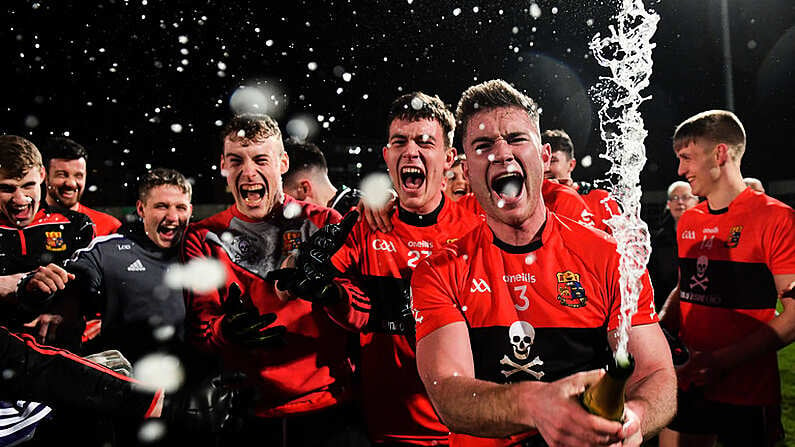 20 February 2019; Kevin Flahive of UCC celebrates with champagne after the Electric Ireland HE GAA Sigerson Cup Final match between St Mary's University College Belfast and University College Cork at O'Moore Park in Portlaoise, Laois. Photo by Piaras O Midheach/Sportsfile