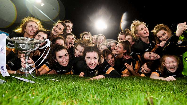 8 December 2018; Mourneabbey players celebrate with the Dolores Tyrrell Memorial Cup following the All-Ireland Ladies Football Senior Club Championship Final match between Mourneabbey and Foxrock-Cabinteely at Parnell Park in Dublin. Photo by Stephen McCarthy/Sportsfile