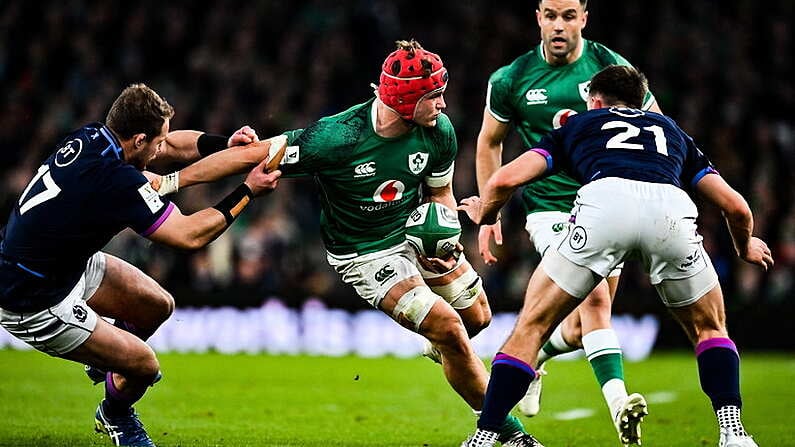 19 March 2022; Josh van der Flier of Ireland is tackled by Allan Dell of Scotland during the Guinness Six Nations Rugby Championship match between Ireland and Scotland at Aviva Stadium in Dublin. Photo by Brendan Moran/Sportsfile