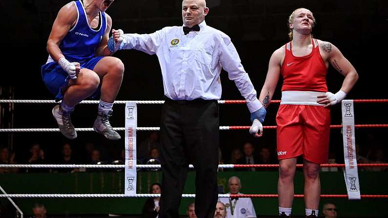 21 January 2023; Grainne Walsh of Spartacus Boxing Club, Offaly, left, celebrates after her victory over Amy Broadhurst of St Bronagh's ABC, Louth, in their welterweight 66kg final bout at the IABA National Elite Boxing Championships Finals at the National Boxing Stadium in Dublin. Photo by Seb Daly/Sportsfile