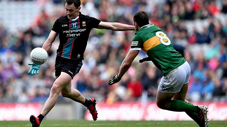 26 June 2022; Diarmuid O'Connor of Mayo in action against David Moran of Kerry during the GAA Football All-Ireland Senior Championship Quarter-Final match between Kerry and Mayo at Croke Park, Dublin. Photo by Piaras O Midheach/Sportsfile