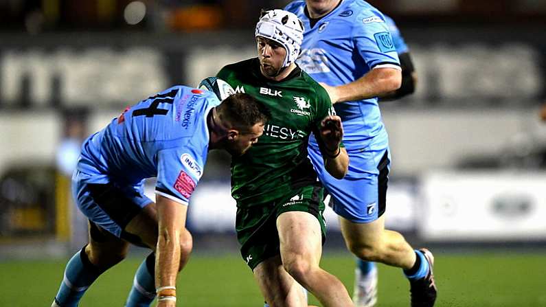 24 September 2021; Mack Hansen of Connacht evades the tackle of Owen Lane of Cardiff Blues during the United Rugby Championship match between Cardiff Blues and Connacht at Arms Park in Cardifff, Wales. Photo by Ben Evans/Sportsfile