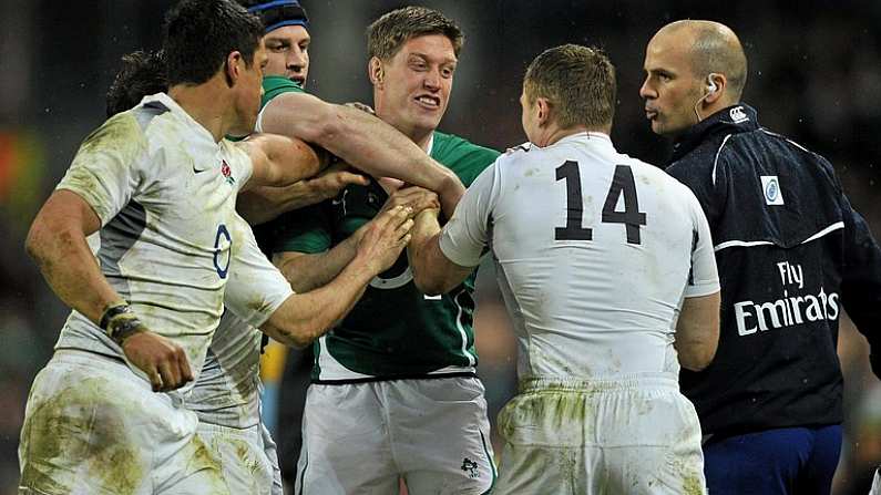 19 March 2011; Ireland's Ronan O'Gara and England's Chris Ashton clash during the second half. RBS Six Nations Rugby Championship, Ireland v England, Aviva Stadium, Lansdowne Road, Dublin. Picture credit: David Maher / SPORTSFILE