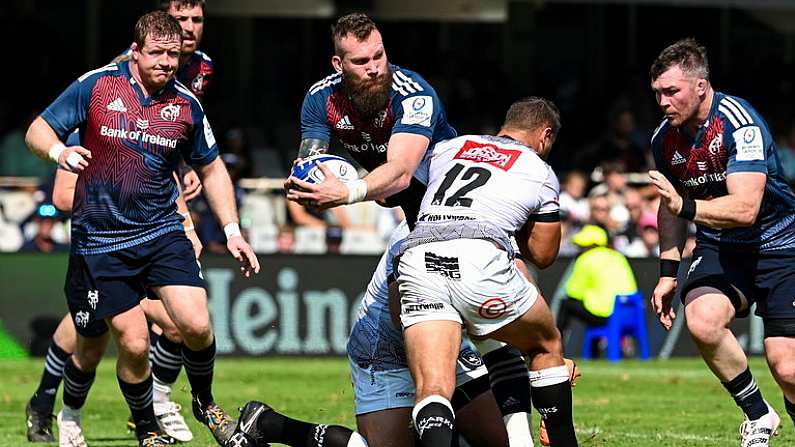 1 April 2023; RG Snyman of Munster is tackled by Rohan Janse van Rensburg of Cell C Sharks during the Heineken Champions Cup Round of 16 match between Cell C Sharks and Munster at Hollywoodbets Kings Park Stadium in Durban, South Africa. Photo by Darren Stewart/Sportsfile