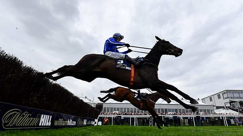 25 April 2023; Energumene with Paul Townend up, jumps the last, on their way to winning the William Hill Champion Steeplechase during day one of the Punchestown Festival at Punchestown Racecourse in Kildare. Photo by Harry Murphy/Sportsfile