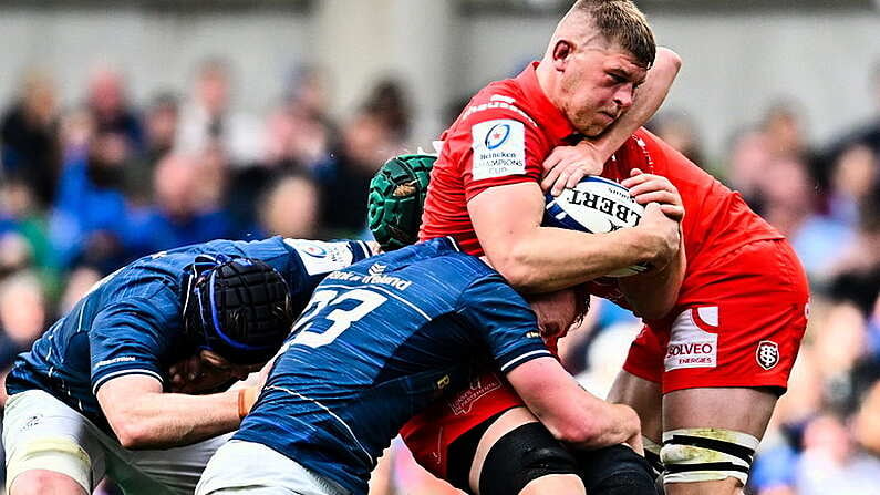 29 April 2023; Jack Willis of Toulouse is tackled by Caelan Doris and Ciaran Frawley of Leinster during the Heineken Champions Cup Semi Final match between Leinster and Toulouse at the Aviva Stadium in Dublin. Photo by Ramsey Cardy/Sportsfile