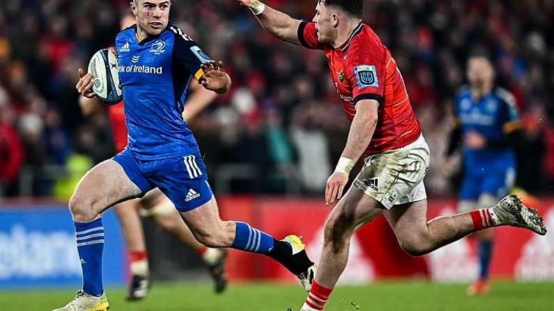 26 December 2022; Luke McGrath of Leinster in action against Calvin Nash of Munster during the United Rugby Championship match between Munster and Leinster at Thomond Park in Limerick. Photo by Eoin Noonan/Sportsfile