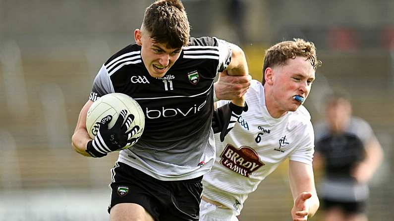 7 May 2022; Lee Deignan of Sligo in action against James McGrath of Kildare during the EirGrid GAA Football All-Ireland U20 Championship Semi-Final match between Sligo and Kildare at Kingspan Breffni in Cavan. Photo by Seb Daly/Sportsfile