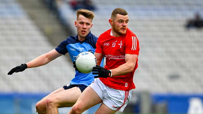 26 March 2023; Niall Sharkey of Louth in action against Daire Newcombe of Dublin during the Allianz Football League Division 2 match between Dublin and Louth at Croke Park in Dublin. Photo by Ray McManus/Sportsfile