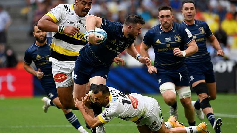 28 May 2022; Robbie Henshaw of Leinster is tackled by Dillyn Leyds of La Rochelle during the Heineken Champions Cup Final match between Leinster and La Rochelle at Stade Velodrome in Marseille, France. Photo by Harry Murphy/Sportsfile