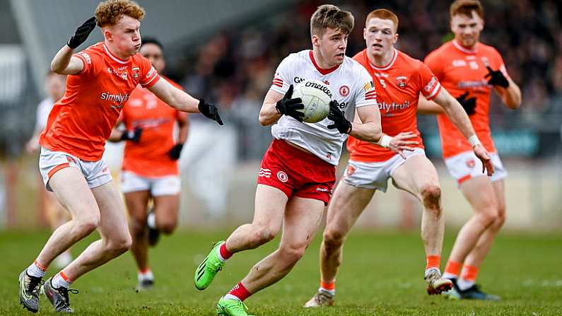 26 March 2023; Cormac Quinn of Tyrone in action against Conor Turbitt, left, and Ciaran Mackin of Armagh during the Allianz Football League Division 1 match between Tyrone and Armagh at O'Neill's Healy Park in Omagh, Tyrone. Photo by Ramsey Cardy/Sportsfile