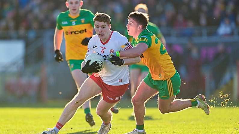 5 February 2023; Peter Harte of Tyrone is tackled by Martin O'Reilly of Donegal during the Allianz Football League Division 1 match between Tyrone and Donegal at O'Neill's Healy Park in Omagh, Tyrone. Photo by Ramsey Cardy/Sportsfile