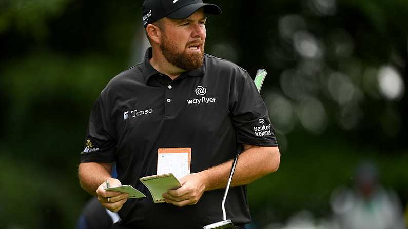 30 June 2022; Shane Lowry of Ireland consults his yardage book during day one of the Horizon Irish Open Golf Championship at Mount Juliet Golf Club in Thomastown, Kilkenny. Photo by Eoin Noonan/Sportsfile