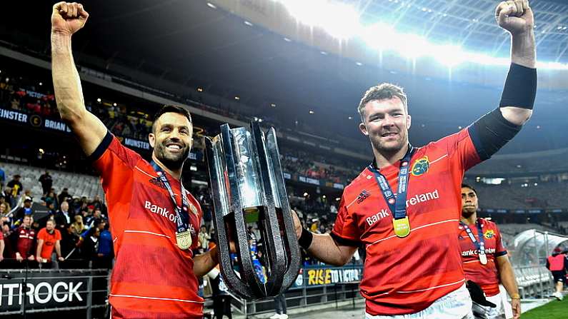 27 May 2023; Munster players Conor Murray, left, and captain Peter O'Mahony celebrate with the trophy after the United Rugby Championship Final match between DHL Stormers and Munster at DHL Stadium in Cape Town, South Africa. Photo by Ashley Vlotman/Sportsfile