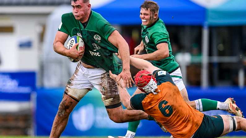 29 June 2023; Brian Gleeson of Ireland is tackled by Lachlan Hooper of Australia during the U20 Rugby World Cup match between Australia and Ireland at Paarl Gymnasium in Paarl, South Africa. Photo by Thinus Maritz/Sportsfile