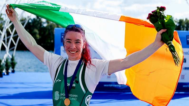 8 September 2023; Siobhan McCrohan of Ireland celebrates with the Irish tricolour and her gold medal after finishing first with a time of 8:47.96 in the Lightweight Women's Single Sculls final A during the 2023 World Rowing Championships at Ada Ciganlija regatta course on Sava Lake, Belgrade. Photo by Nikola Krstic/Sportsfile