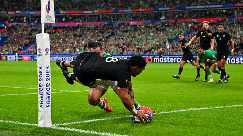 14 October 2023; Ardie Savea of New Zealand dives over to score his side's second try, in the 34th minute, despite the efforts of Ireland's James Lowe, during the 2023 Rugby World Cup quarter-final match between Ireland and New Zealand at the Stade de France in Paris, France. Photo by Ramsey Cardy/Sportsfile