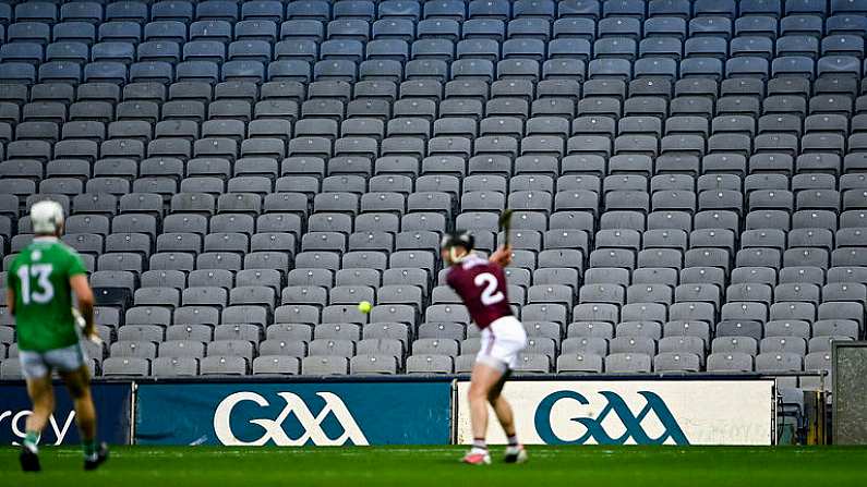 29 November 2020; Empty seats in the Davin End as Aidan Harte of Galway clears the ball downfield during the GAA Hurling All-Ireland Senior Championship Semi-Final match between Limerick and Galway at Croke Park in Dublin. Photo by Piaras O Midheach/Sportsfile