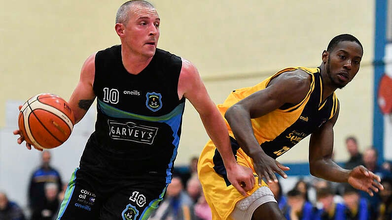 25 October 2019; Kieran Donaghy of Garveys Tralee Warriors in action against Ja'Kwan Jones of Keanes Supervalu Killorglin during the Hula Hoops Pat Duffy Men's National Cup 1st Round match between Keanes Supervalu Killorglin and Garveys Tralee Warriors at Killorglin Sports Centre in Killorglin, Kerry. Photo by Brendan Moran/Sportsfile