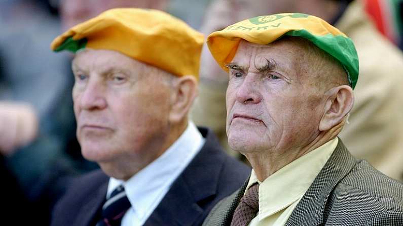 25 September 2005; Two elderly Kerry fans watch their side in action against Tyrone. Bank of Ireland All-Ireland Senior Football Championship Final, Kerry v Tyrone, Croke Park, Dublin. Picture credit; Brendan Moran / SPORTSFILE *** Local Caption *** Any photograph taken by SPORTSFILE during, or in connection with, the 2005 Bank of Ireland All-Ireland Senior Football Final which displays GAA logos or contains an image or part of an image of any GAA intellectual property, or, which contains images of a GAA player/players in their playing uniforms, may only be used for editorial and non-advertising purposes.  Use of photographs for advertising, as posters or for purchase separately is strictly prohibited unless prior written approval has been obtained from the Gaelic Athletic Association.