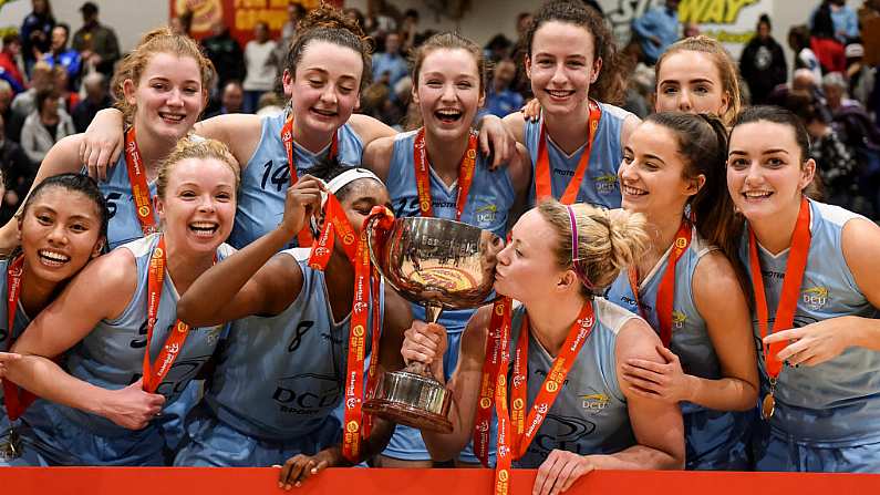 28 January 2018; DCU Mercy players celebrate with the cup after the Hula Hoops Womens National Cup Final match between DCU Mercy and Ambassador UCC Glanmire at the National Basketball Arena in Tallaght, Dublin. Photo by Eoin Noonan/Sportsfile