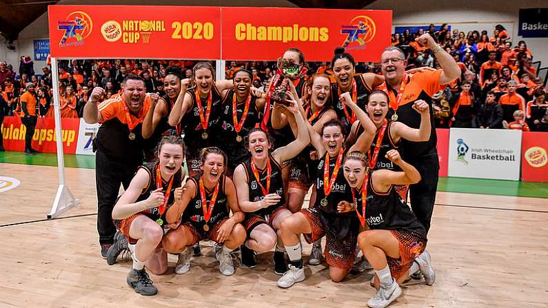 26 January 2020; The Pyrobel Killester team celebrate with the cup after the Hula Hoops Paudie OConnor National Cup Final between Singleton SuperValu Brunell and Pyrobel Killester at the National Basketball Arena in Tallaght, Dublin. Photo by Brendan Moran/Sportsfile