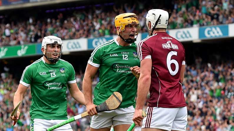 19 August 2018; Tom Morrissey of Limerick celebrates in front of Gearoid McInerney of Galway after scoring his side's second goal during the GAA Hurling All-Ireland Senior Championship Final match between Galway and Limerick at Croke Park in Dublin. Photo by Seb Daly/Sportsfile